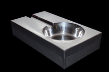 Silver made cigar ashtray with a rectangular box shape and an even finish.