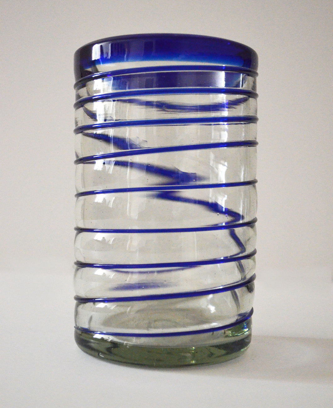 Hand blown water glass with blue spiral finish