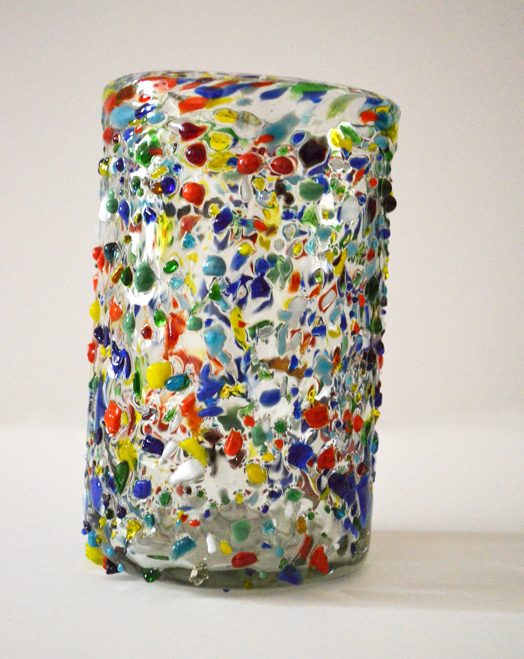 Hand blown water glass with a colorful finish