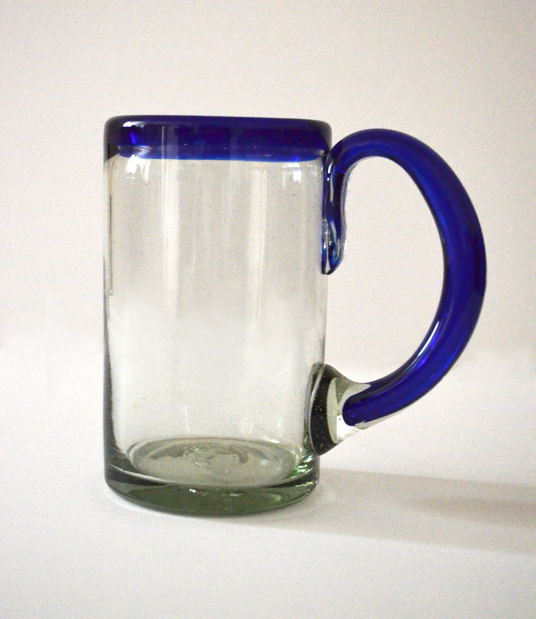 Hand blown beer glass with a blue rim
