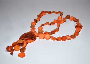 Orange skin necklace balls with flower