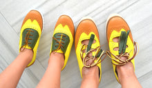 Mom and daughter pineapple style shoes.