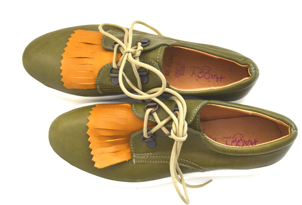 Mom and daughter mustard style shoes.