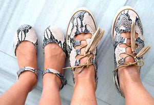 Mom and daughter nude snake print shoes.